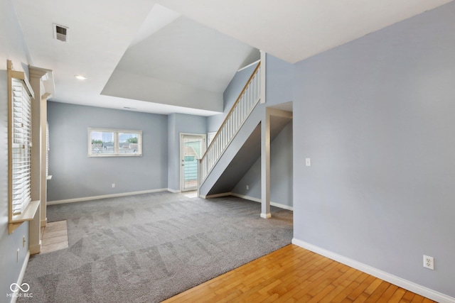 455 S Pine St Unit 4, Indianapolis, IN 46203 - additional living space with stairs, baseboards, and wood finished floors