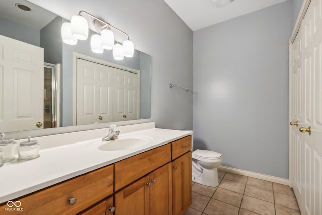 455 S Pine St Unit 4, Indianapolis, IN 46203 - full bath featuring a shower with door, vanity, tile patterned flooring, toilet, and baseboards