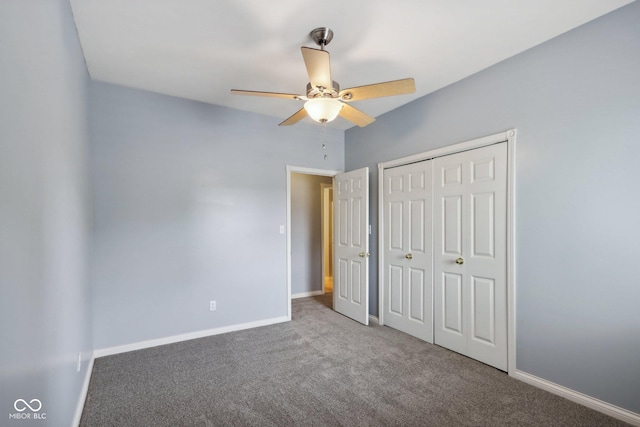 455 S Pine St Unit 4, Indianapolis, IN 46203 - unfurnished bedroom featuring carpet flooring, a closet, baseboards, and a ceiling fan