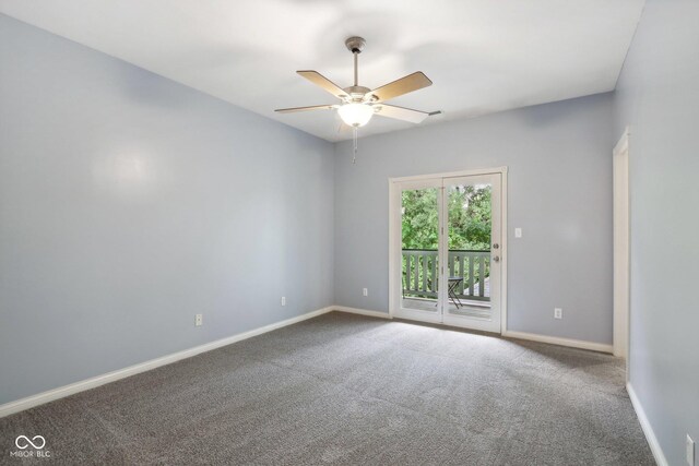 455 S Pine St Unit 4, Indianapolis, IN 46203 - unfurnished room featuring a ceiling fan, baseboards, and carpet flooring