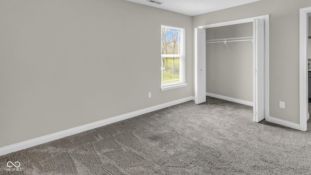 3583 Collier Dr, Lafayette, IN 47905 - unfurnished bedroom with carpet flooring, baseboards, and a closet