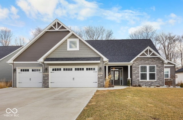 3583 Collier Dr, Lafayette, IN 47905 - craftsman house featuring stone siding, driveway, a front lawn, a shingled roof, and an attached garage