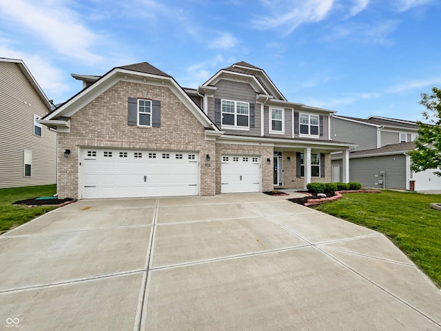 1276 Sanderling Dr, Greenwood, IN 46143 - craftsman-style home with brick siding, an attached garage, driveway, a front lawn, and covered porch