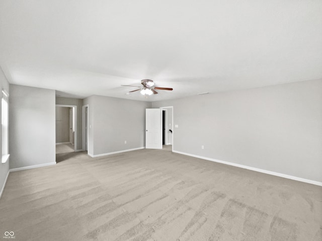 1276 Sanderling Dr, Greenwood, IN 46143 - empty room with a ceiling fan, baseboards, and carpet floors