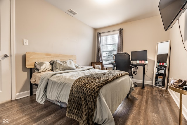 3047 N New Jersey St, Indianapolis, IN 46205 - bedroom with dark wood-style flooring, baseboards, and vaulted ceiling