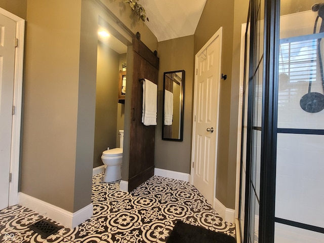 1714 Michelle Mnr, Danville, IN 46122 - bathroom featuring toilet, a shower, and baseboards
