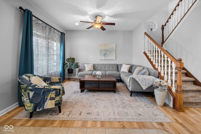 3449 Brixford Ln, West Lafayette, IN 47906 - living area with ceiling fan, wood finished floors, stairway, baseboards, and recessed lighting