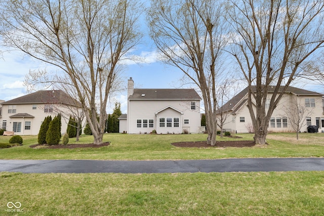 3449 Brixford Ln, West Lafayette, IN 47906 - view of front of house with a chimney and a front yard