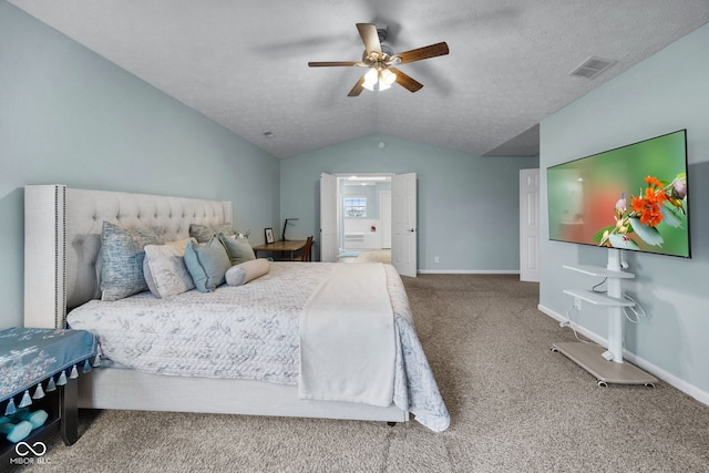 3449 Brixford Ln, West Lafayette, IN 47906 - carpeted bedroom featuring vaulted ceiling, baseboards, ceiling fan, a textured ceiling, and ensuite bath