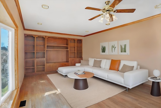 186 W 600 N, Alexandria, IN 46001 - living area featuring crown molding, ceiling fan, and light wood-type flooring