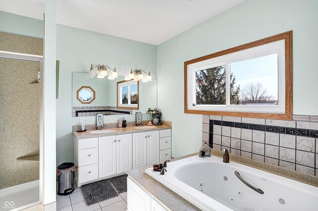 186 W 600 N, Alexandria, IN 46001 - bathroom with tile patterned flooring, a whirlpool tub, and vanity