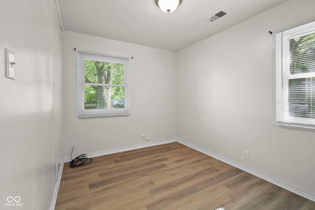 611 Hampton Ln, Anderson, IN 46017 - empty room with light wood-style flooring and baseboards