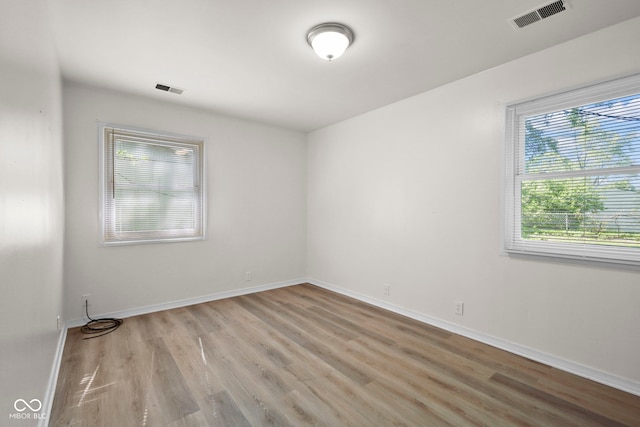 611 Hampton Ln, Anderson, IN 46017 - empty room with wood finished floors and baseboards