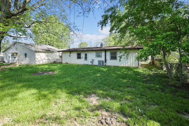 611 Hampton Ln, Anderson, IN 46017 - back of house featuring central AC unit