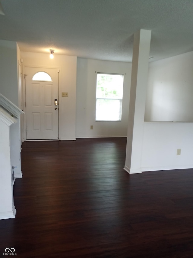 10795 Albertson Dr, Indianapolis, IN 46231 - entryway featuring dark wood-type flooring and baseboards