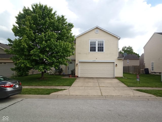 10795 Albertson Dr, Indianapolis, IN 46231 - traditional home featuring an attached garage and concrete driveway