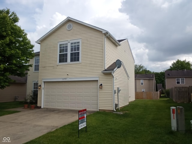 10795 Albertson Dr, Indianapolis, IN 46231 - view of front facade with a garage and driveway