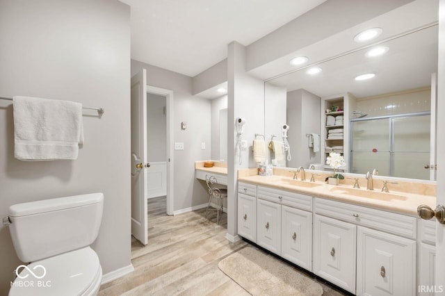 3000 E County Road 400 N, Muncie, IN 47303 - bathroom featuring toilet, a shower stall, wood finished floors, recessed lighting, and double vanity