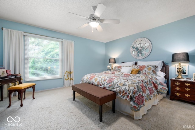 3000 E County Road 400 N, Muncie, IN 47303 - carpeted bedroom featuring a textured ceiling, a ceiling fan, and baseboards