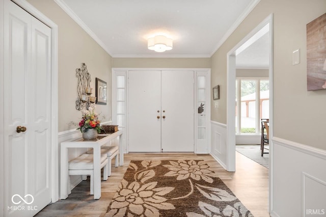 3000 E County Road 400 N, Muncie, IN 47303 - foyer with wood finished floors, a wainscoted wall, and crown molding