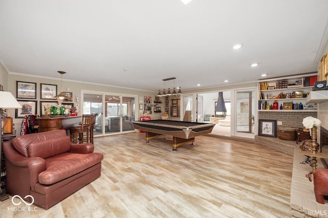 3000 E County Road 400 N, Muncie, IN 47303 - playroom featuring crown molding, pool table, a bar, a fireplace, and wood finished floors