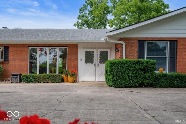 3000 E County Road 400 N, Muncie, IN 47303 - doorway to property with brick siding and roof with shingles