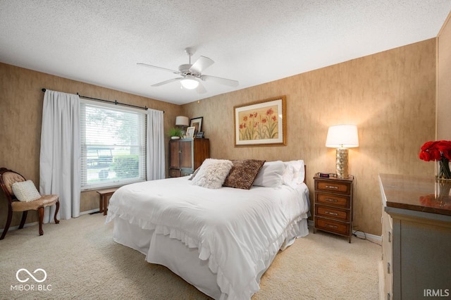 3000 E County Road 400 N, Muncie, IN 47303 - bedroom with light colored carpet, baseboards, a ceiling fan, and a textured ceiling