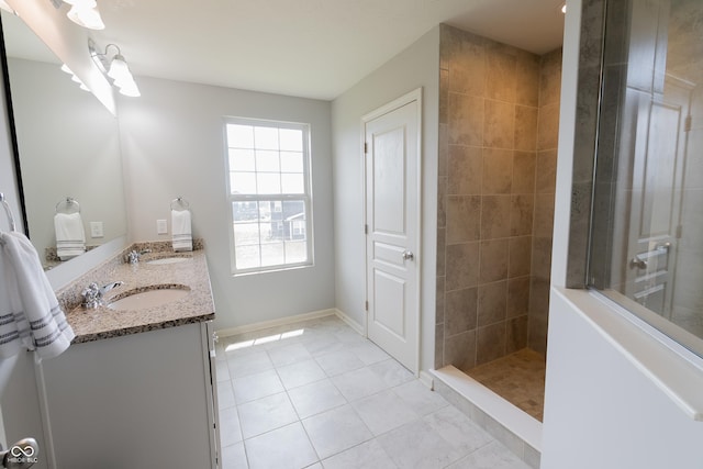 4863 Sherlock Dr, Westfield, IN 46062 - bathroom featuring a walk in shower, tile patterned floors, and double vanity