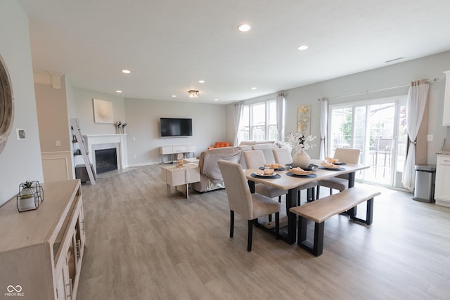 4863 Sherlock Dr, Westfield, IN 46062 - dining space with light wood-style floors, recessed lighting, and a high end fireplace