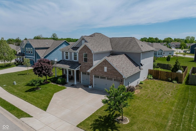 4863 Sherlock Dr, Westfield, IN 46062 - traditional home with a residential view, an attached garage, concrete driveway, brick siding, and a shingled roof