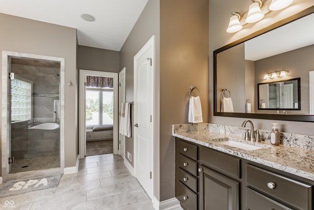 10784 Giselle Way, Fishers, IN 46040 - bathroom with baseboards, vanity, and a shower stall