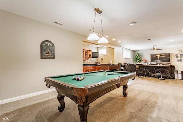 10784 Giselle Way, Fishers, IN 46040 - recreation room featuring light colored carpet, bar with sink, billiards, recessed lighting, and baseboards