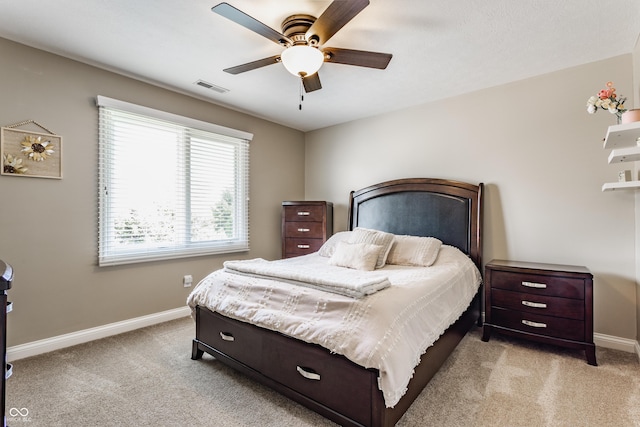 10784 Giselle Way, Fishers, IN 46040 - bedroom with light carpet, baseboards, and a ceiling fan