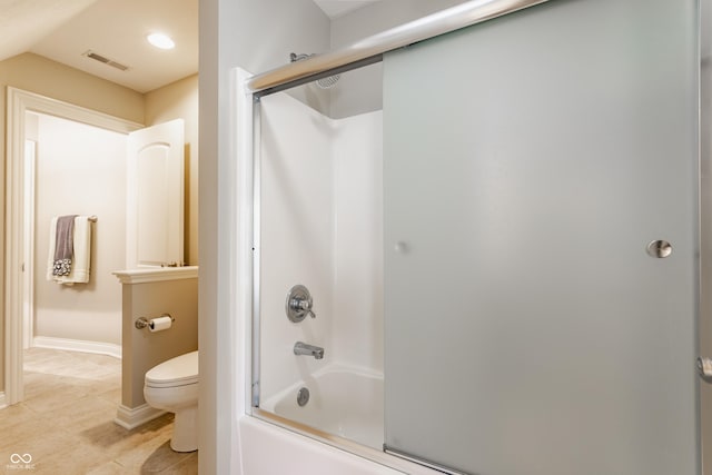 10784 Giselle Way, Fishers, IN 46040 - bathroom featuring toilet, combined bath / shower with glass door, lofted ceiling, recessed lighting, and tile patterned flooring