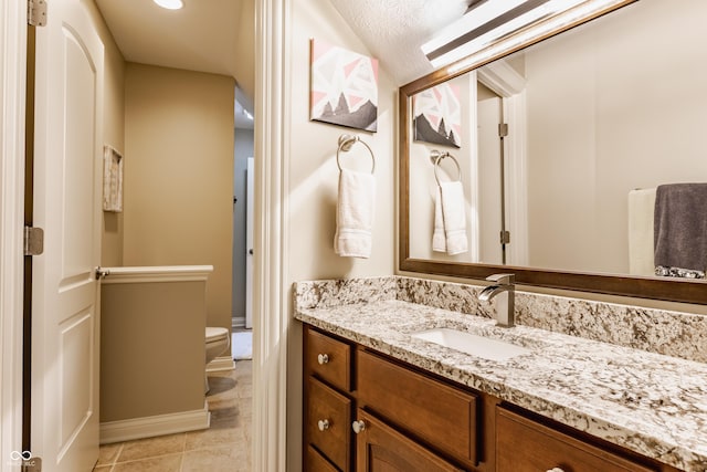 10784 Giselle Way, Fishers, IN 46040 - bathroom with vanity, toilet, tile patterned flooring, and baseboards