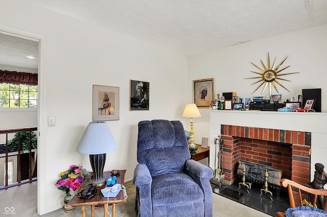 sitting room with a brick fireplace and baseboards