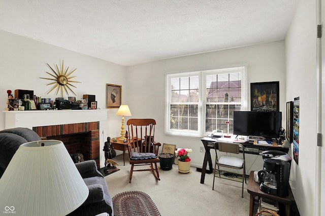 office space featuring carpet flooring and a fireplace