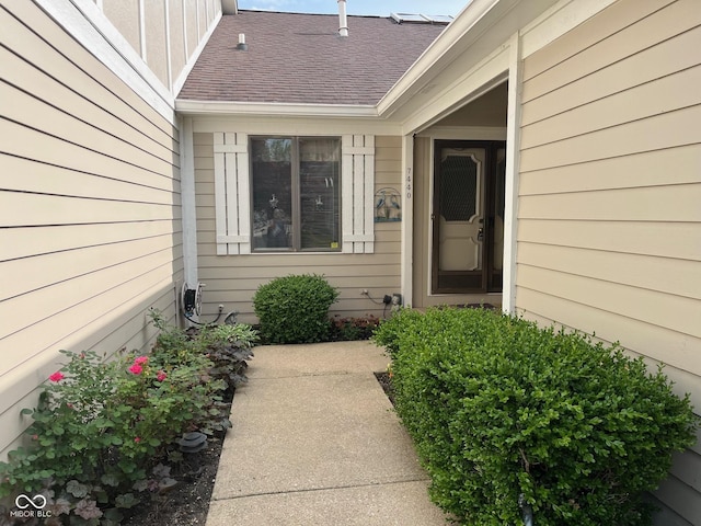 7440 Sylvan Ridge Rd, Indianapolis, IN 46240 - property entrance with roof with shingles