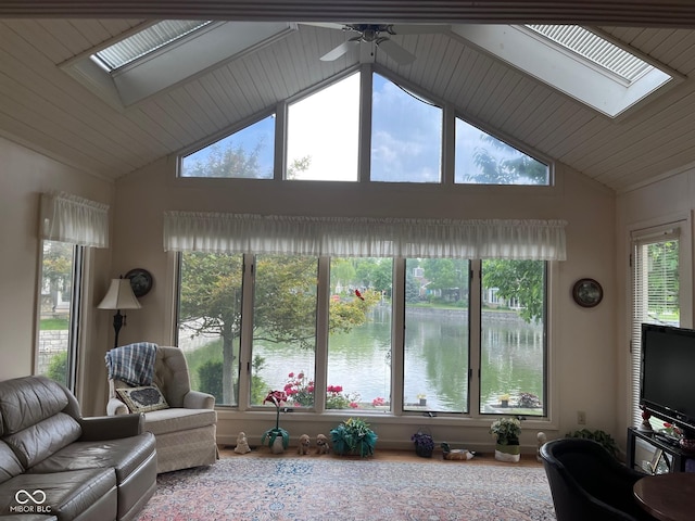 7440 Sylvan Ridge Rd, Indianapolis, IN 46240 - living area featuring a skylight, high vaulted ceiling, ceiling fan, and wood ceiling
