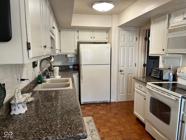 7440 Sylvan Ridge Rd, Indianapolis, IN 46240 - kitchen featuring white appliances, a sink, backsplash, and white cabinets