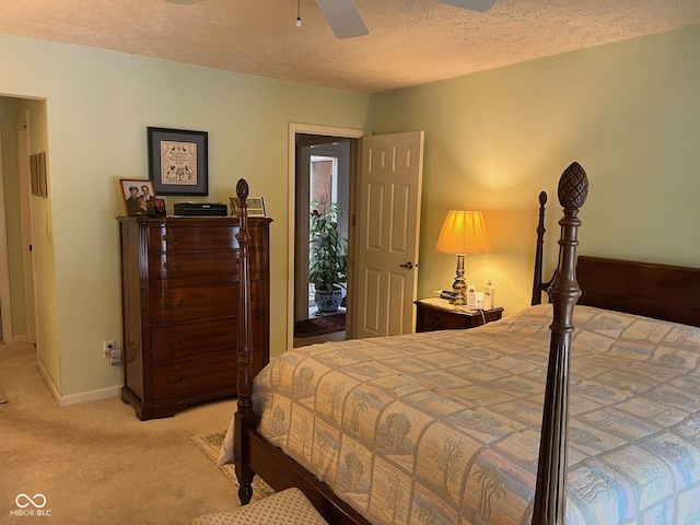 7440 Sylvan Ridge Rd, Indianapolis, IN 46240 - bedroom featuring light carpet, a textured ceiling, baseboards, and a ceiling fan