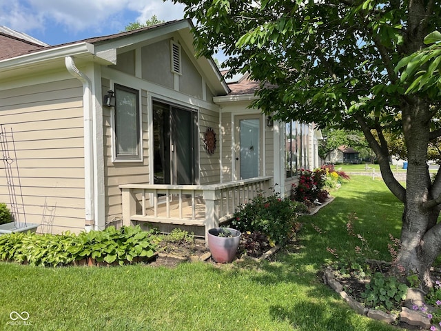 7440 Sylvan Ridge Rd, Indianapolis, IN 46240 - property entrance featuring a yard and roof with shingles