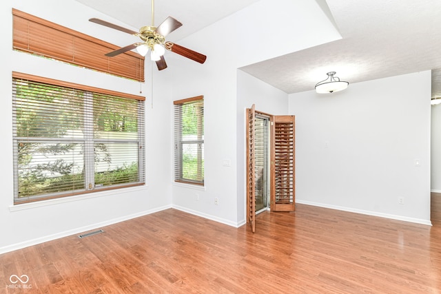 1030 Longwell Pl, Indianapolis, IN 46240 - unfurnished room featuring wood finished floors, a ceiling fan, and baseboards
