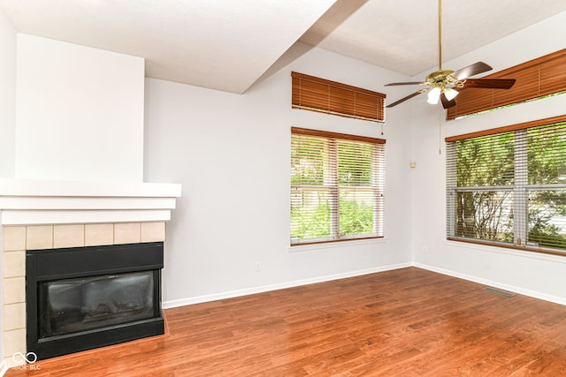 1030 Longwell Pl, Indianapolis, IN 46240 - unfurnished living room featuring ceiling fan, wood finished floors, and baseboards