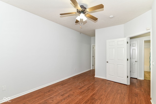 1030 Longwell Pl, Indianapolis, IN 46240 - unfurnished bedroom with wood finished floors, baseboards, and ceiling fan