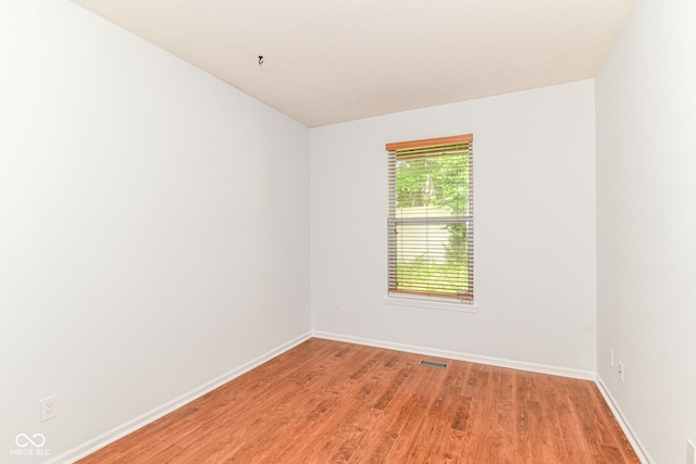1030 Longwell Pl, Indianapolis, IN 46240 - empty room with baseboards and light wood-type flooring