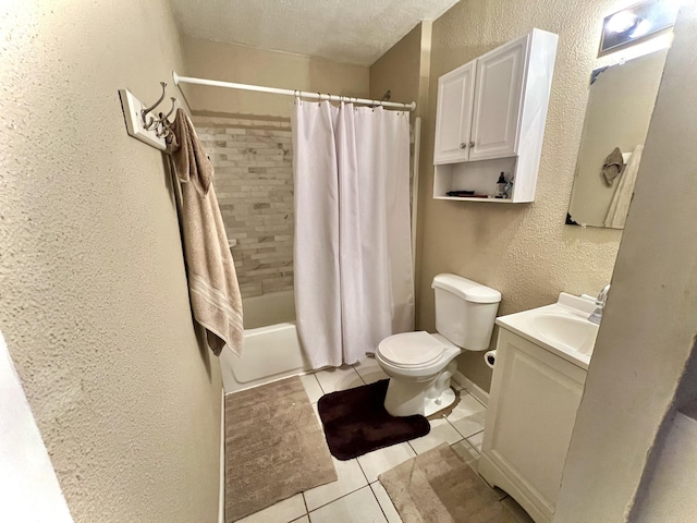1332 W 26th St, Indianapolis, IN 46208 - bathroom featuring a textured wall, tile patterned floors, toilet, vanity, and a textured ceiling