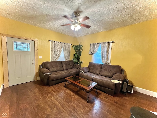 1332 W 26th St, Indianapolis, IN 46208 - living area with wood finished floors, a textured ceiling, ceiling fan, and baseboards