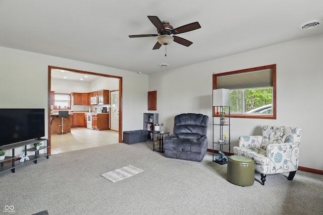 1478 W 500 S, Peru, IN 46970 - living area featuring ceiling fan, light carpet, baseboards, and recessed lighting