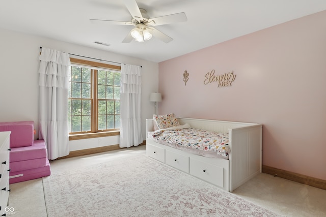 1478 W 500 S, Peru, IN 46970 - bedroom with baseboards, a ceiling fan, and light colored carpet